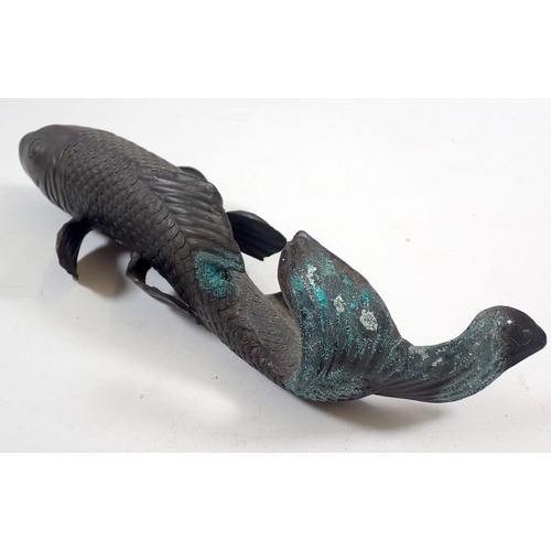 851 - A Japanese bronze model of a Koi carp, 30cm long