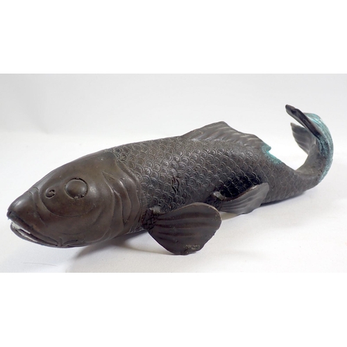 851 - A Japanese bronze model of a Koi carp, 30cm long