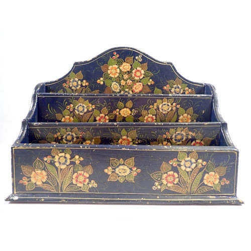 874 - A vintage wooden floral decorated desk top letter rack, 26cm wide