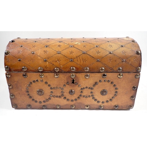 875 - A leather studded wooden dome top box, 26cm wide