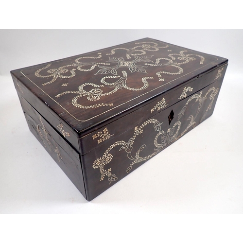 878 - A 19th century ebony jewellery box with bone inlay and fitted interior tray, 28cm wide