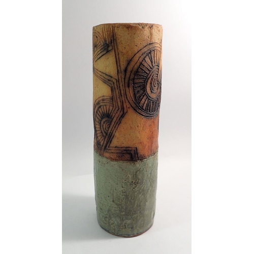 89 - A heavy Studio pottery cylindrical vase with incised decoration, 42cm tall