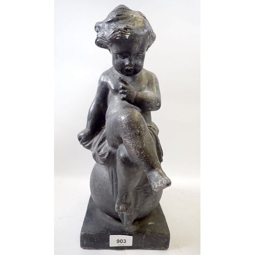 903 - An antique lead garden figure of a cherub seated on sphere, on plinth base, 39cm high