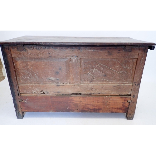 925 - An antique oak mule chest with foliate lunette frieze over two dragon carved panels and two foliate ... 