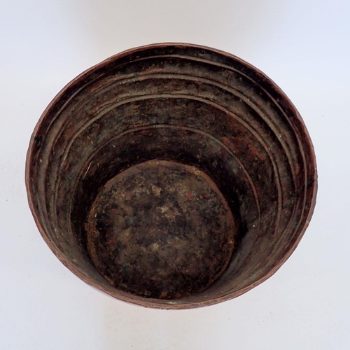 927 - A 19th century large copper circular log bin with brass handles to side, 44cm tall x 50cm diameter