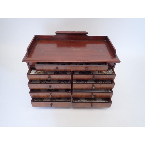 933 - A Victorian mahogany table-top collectors cabinet with gallery top over single long drawer and two r... 