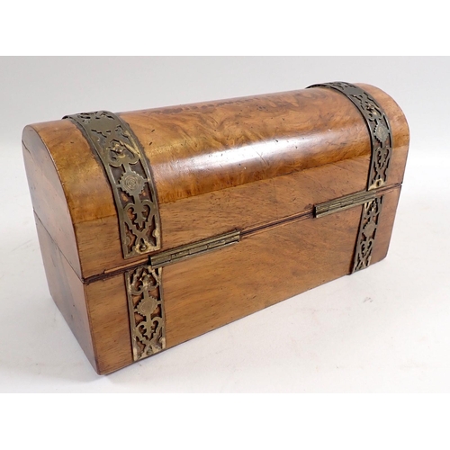 943 - A Victorian walnut small dome top box with brass banding and key, 19cm