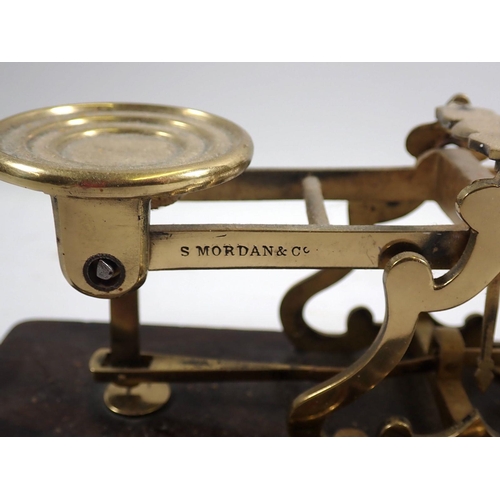 947 - A brass postal scale and weights and five various other weights