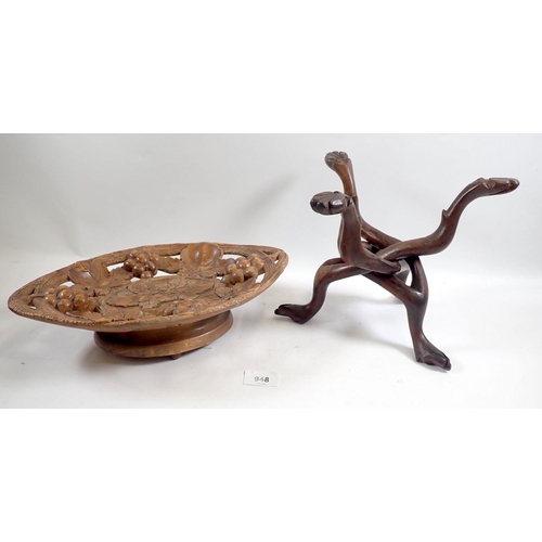 948 - A Black Forest musical fruit bowl carved vines and a folding carved bowl stand