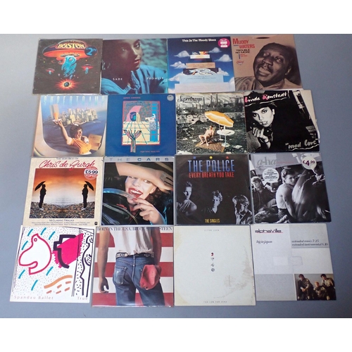 954 - A collection of 49 vinyl LP records of mainly rock and pop including The Beatles, The Police, Gary N... 