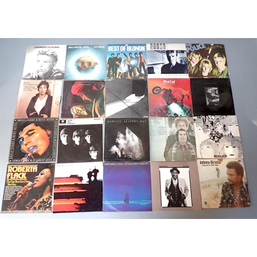 955 - A collection of 50 vinyl LP records of mainly rock and pop including Abba, U2, Elvis Costello, The B... 