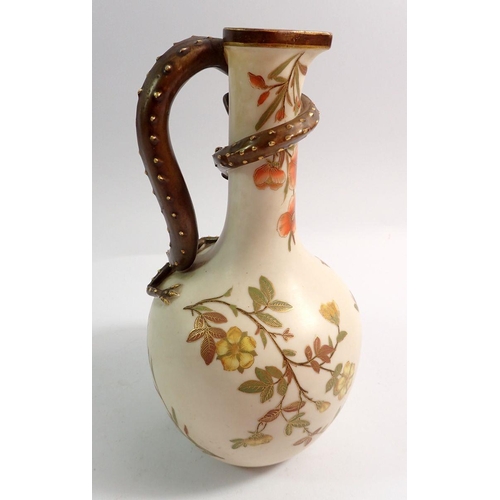 98 - A Royal Worcester jug with entwined serpent handle, 22.5cm tall