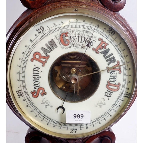 999 - A late 19th century oak aneroid barometer/thermometer, 80cm