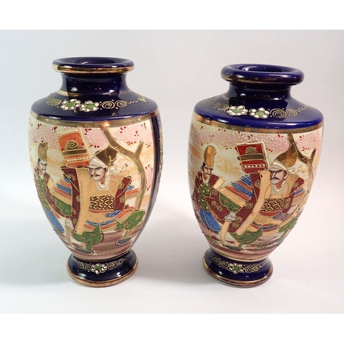 100 - A pair of Japanese late Satsuma vases painted Samuri warriors, 25cm