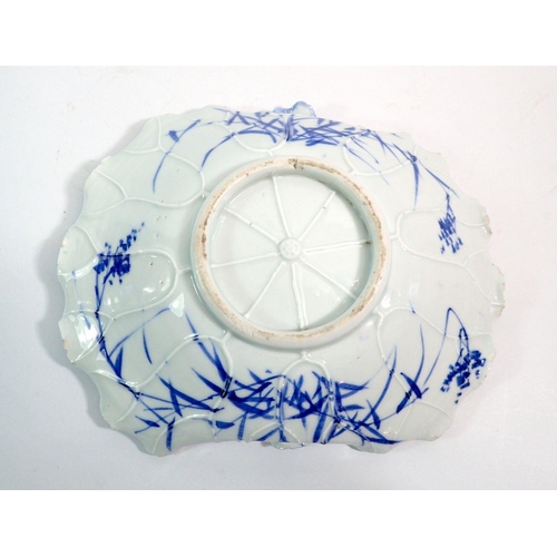 101 - A Japanese porcelain blue and white lily pad dish, 25 x 20cm