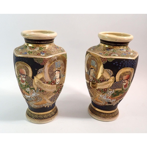 108 - A pair of Japanese hexagonal Satsuma vases painted figures and dragons, 25cm