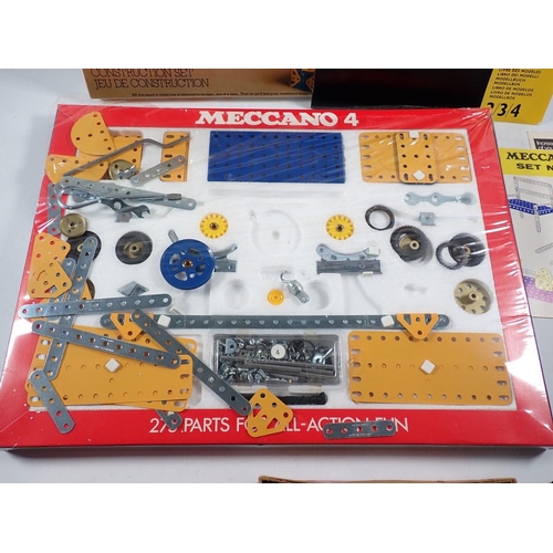 1111 - A Meccano 4 Standard Range 1977 boxed, appears complete, plus a Hornby Series box of parts