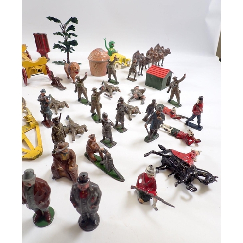 1117 - A group of Britains and various metal painted figures, farm trailers, animals etc.