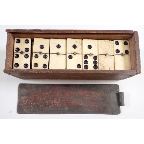 1132 - A set of antique bone and ebony dominoes in wooden box (28)