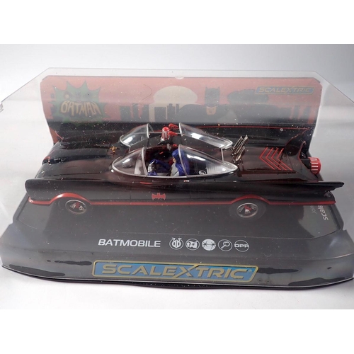 1138 - A Scalextric Batmobile C4175 1966 TV Series and a Joker inspired car C4142, both in original cases i... 