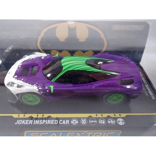 1138 - A Scalextric Batmobile C4175 1966 TV Series and a Joker inspired car C4142, both in original cases i... 