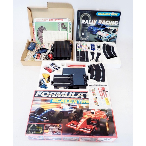 1143 - A Scalextric Rally Racing set, a Scalextric Formula One set plus another Formula 500 slot racing set... 