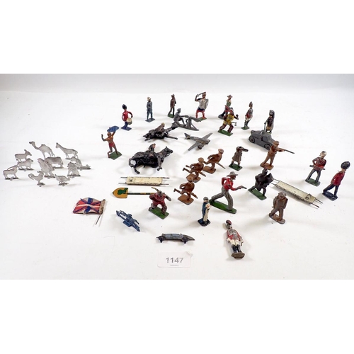 1147 - A group of various metal painted toy soldiers and figures