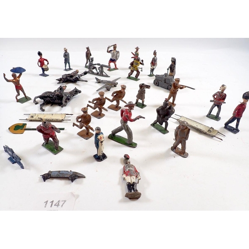 1147 - A group of various metal painted toy soldiers and figures