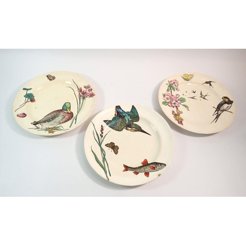 115 - A set of three Minton plates by William Coleman decorated birds and fish in Aesthetic taste, one chi... 