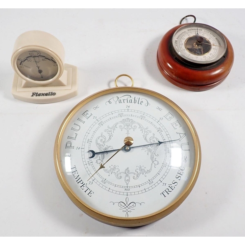 1231 - A French aneroid barometer in circular metal case, a smaller wooden cased barometer and a Rototherm ... 