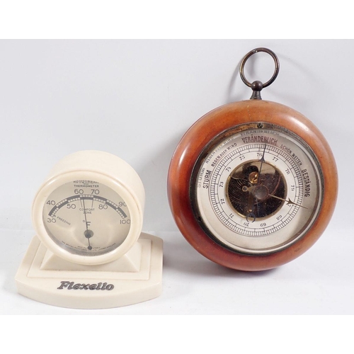 1231 - A French aneroid barometer in circular metal case, a smaller wooden cased barometer and a Rototherm ... 