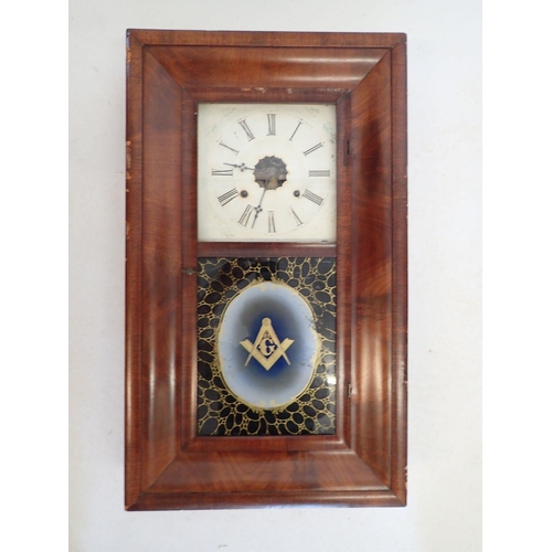 1243 - A 19th century walnut American cased wall clock with masonic motif , 85cm tall