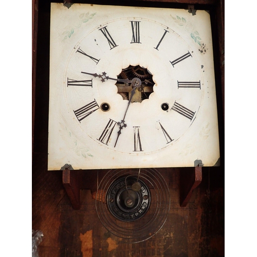 1243 - A 19th century walnut American cased wall clock with masonic motif , 85cm tall