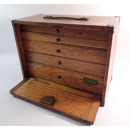 1262 - An oak drop front collectors/engineers tools cabinet comprising five drawers and leather handle by E... 