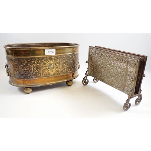 1266 - A brass embossed oval jardiniere, 31cm wide and a brass letter rack with Gothic arch and floral deco... 