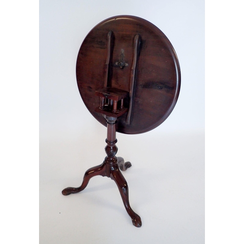 1267 - A Georgian mahogany circular 'bird cage' tilt top occasional table on turned column with triple supp... 