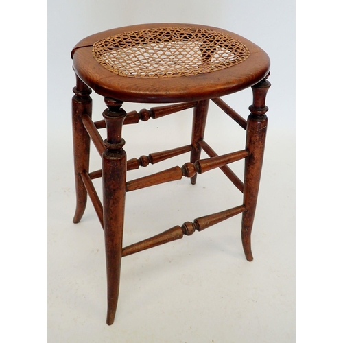 1275 - An early 20th century tall beech and cane stool