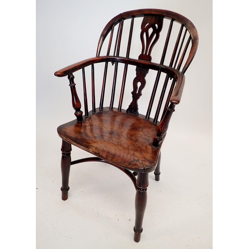 1282 - An early 19th century child's Windsor chair with crinoline stretcher