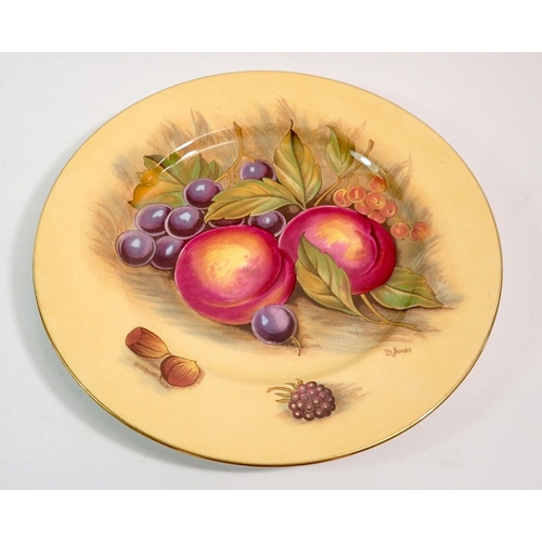 129 - An Aynsley Orchard Gold plate printed fruit by D Jones, 27 diameter