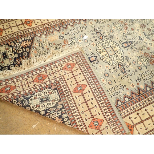 1307 - A Turkoman style rug with stylised floral motifs on a blue grey ground 188 x 123cm