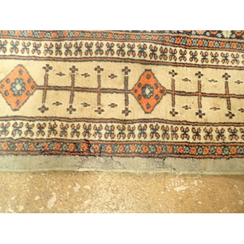 1307 - A Turkoman style rug with stylised floral motifs on a blue grey ground 188 x 123cm