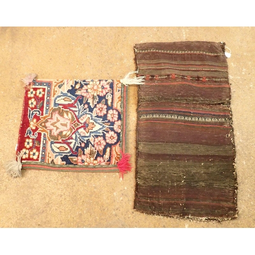 1314 - A Turkoman saddle bag with geometric design and a floral rug cushion cover