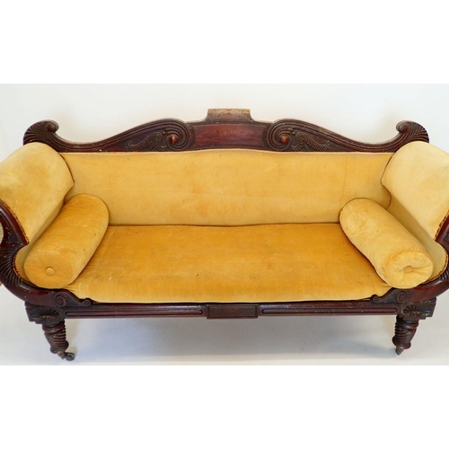 1316 - A fine Regency mahogany sofa with carved scroll back, scroll over arms and turned supports, 205cm wi... 