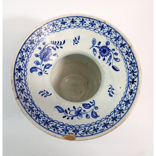 132 - A Delft spittoon painted stylised decoration, 13.5cm, chipped