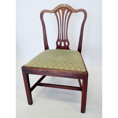 1321 - A Georgian oak dining chair with pierced vase splat