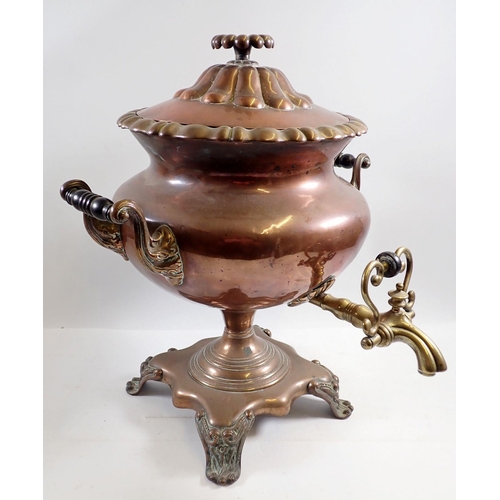 1324 - A Victorian copper and brass bombe form samovar, 40cm tall