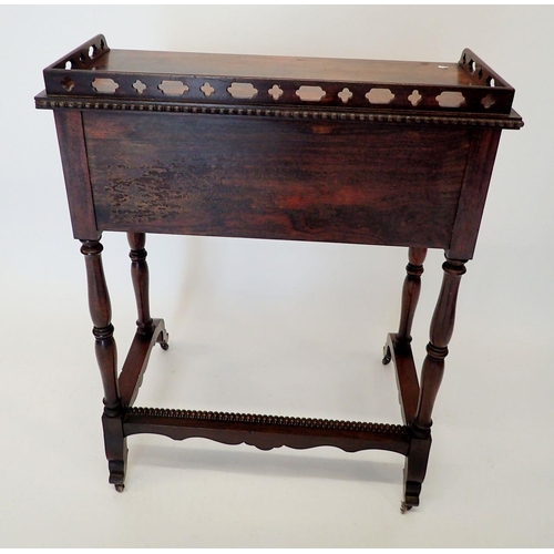 1327 - An unusual Victorian Gothic style mahogany  desk with gallery top over drop down flap to front and t... 