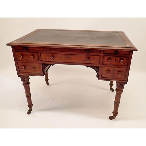 1329 - A Victorian oak desk with frieze drawer and two pairs of small drawers all on turned supports, 107 x... 