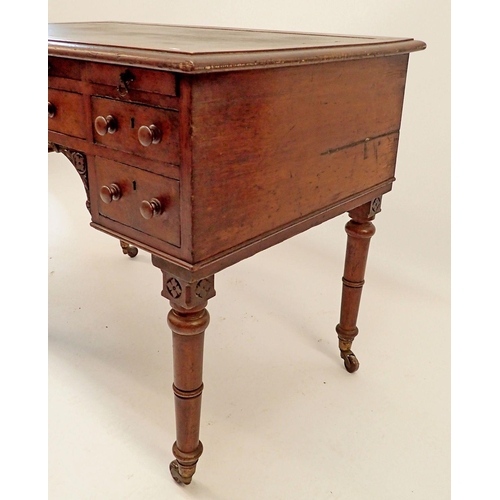 1329 - A Victorian oak desk with frieze drawer and two pairs of small drawers all on turned supports, 107 x... 