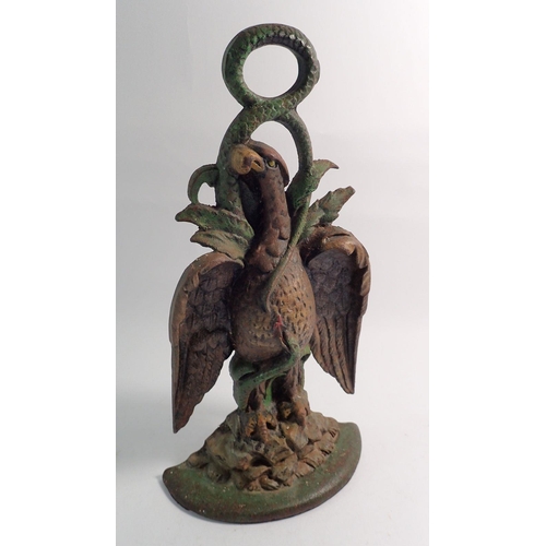 1342 - A Victorian painted cast iron vulture door stop with registration mark, 36cm